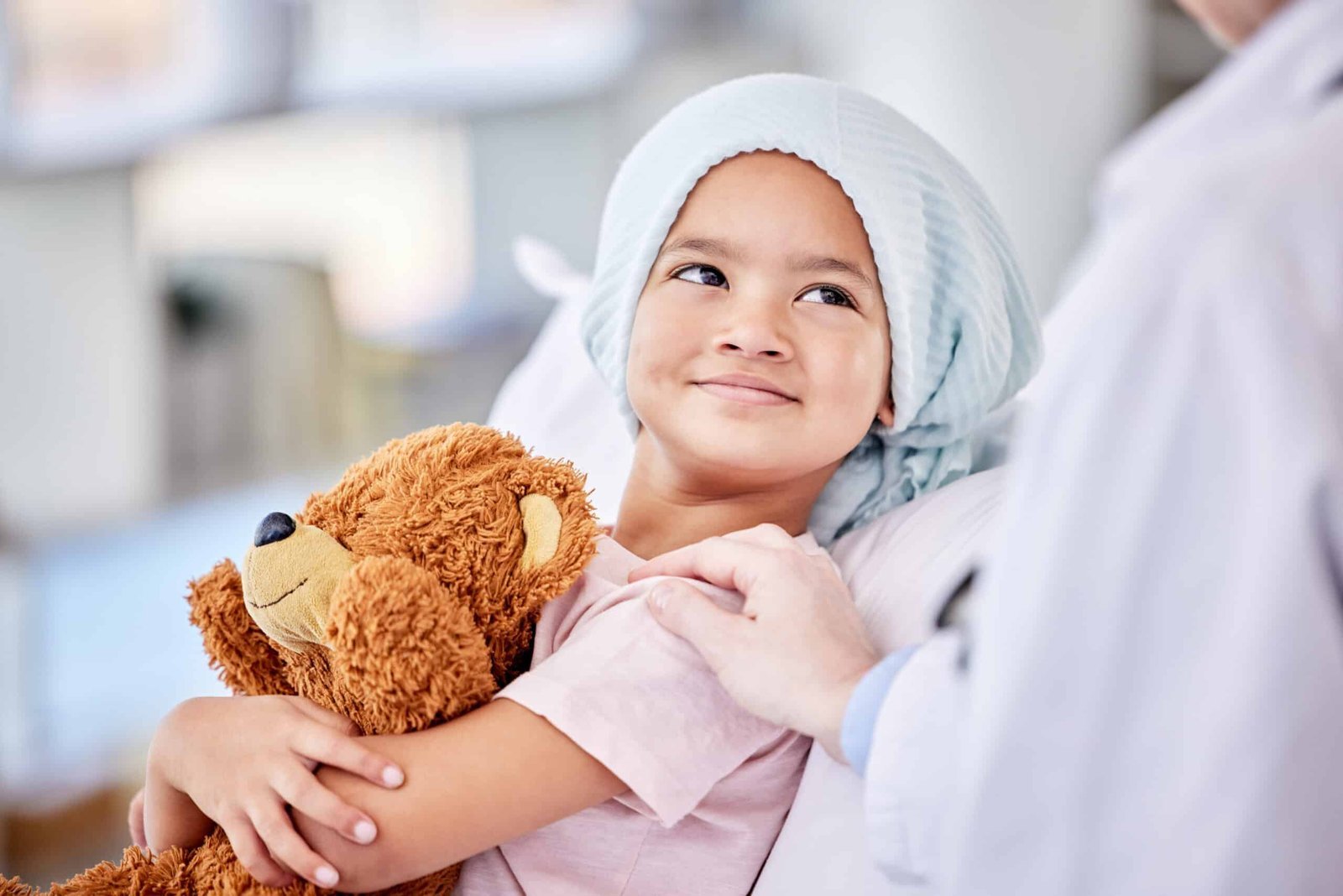 A child smiling during a moment of care